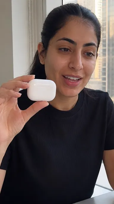 English-speaking creator showing earbuds in Dubai